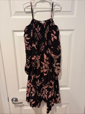 Girls black floral dress size M. Spaghetti straps with long sleeves attached